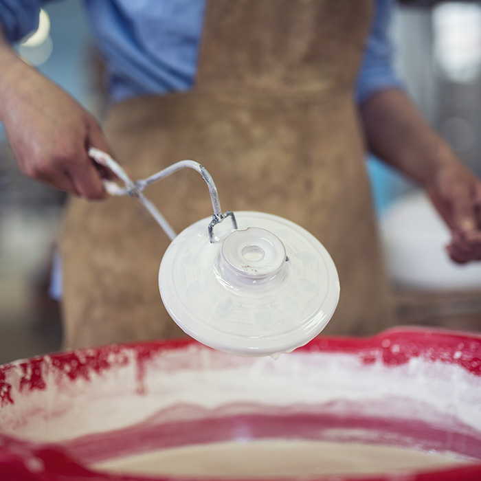 Woman making pottery