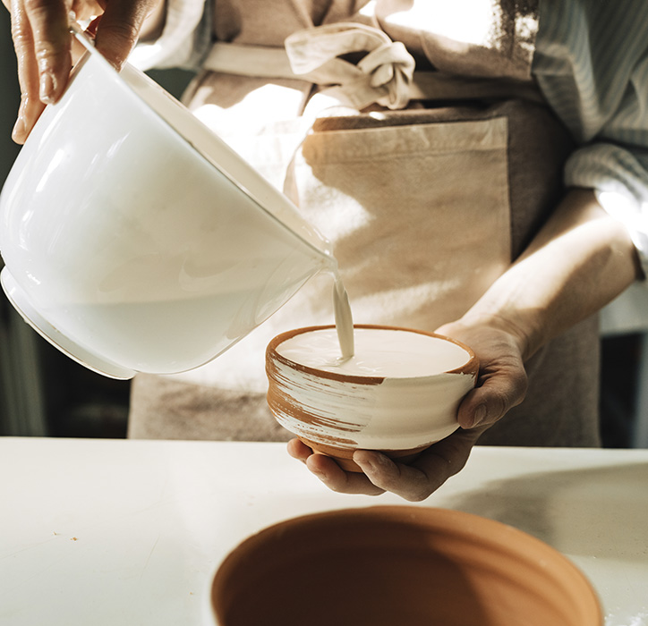 Woman Artisan Colouring Ceramic Bowl